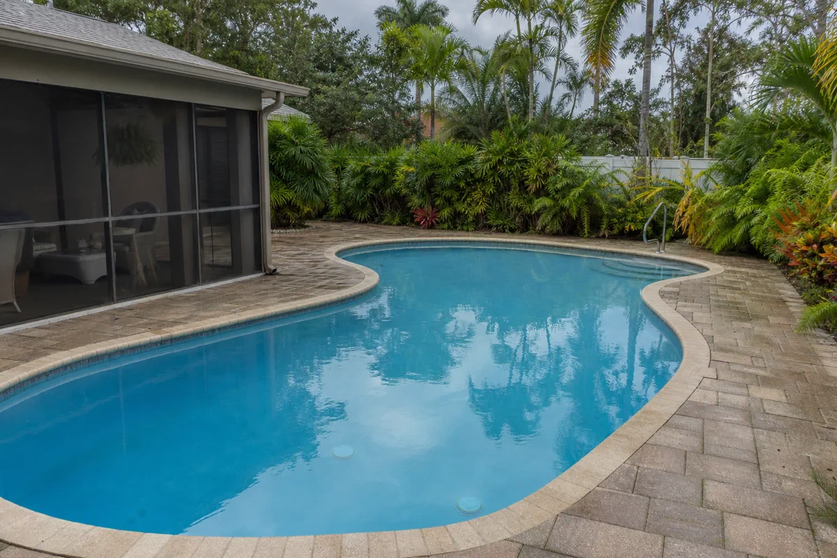 Sarasota pool and deck condition influenced by coastal weather and ground movement